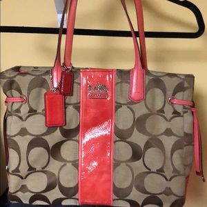 Authentic Coach signature canvas handbag.